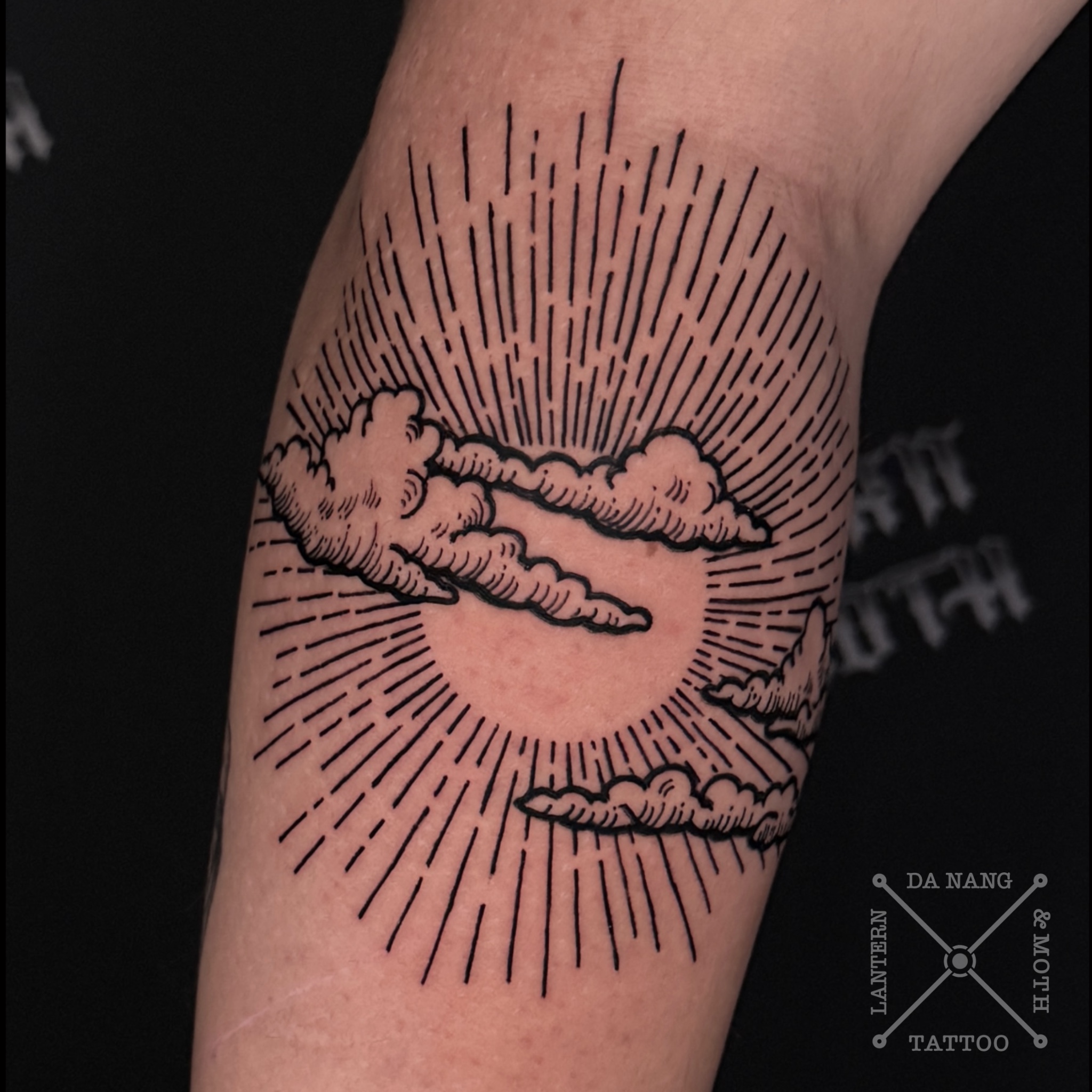 Clouds-and-sun-design-Da-Nang-tattoo-shop