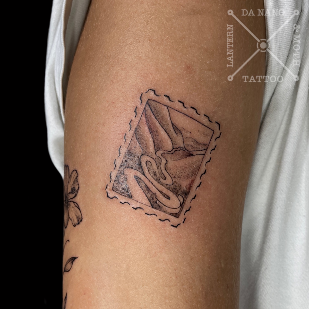 Ha-Giang-Loop-Postage-Stamp-Tattoo-by-Da-Nang-Fine-Line-Tattoo-Artist