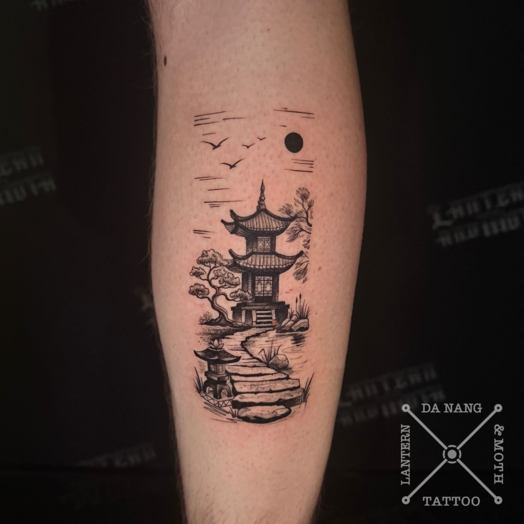 blackwork-pagoda-design-danang-tattoo-studio-lantern-and-moth.